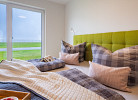 Masterbedroom mit Blick auf die Marina