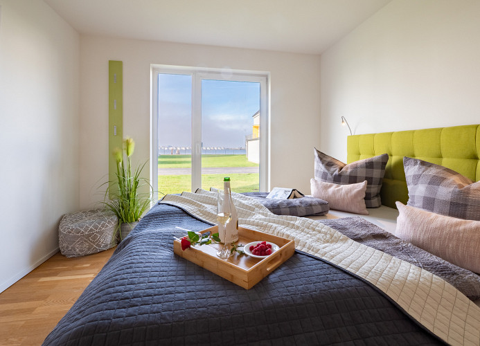 Masterbedroom in der Fewo MEERwert by Seeblick Ferien ORO